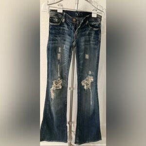 Distressed Blue Jeans